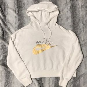 Nike womens size medium cropped hoodie with silver and gold Nike swoosh.